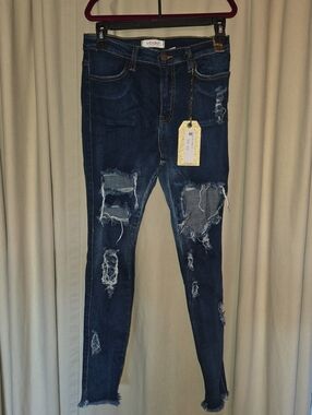 Vibrant Dark Blue Ripped Skinny Jeans